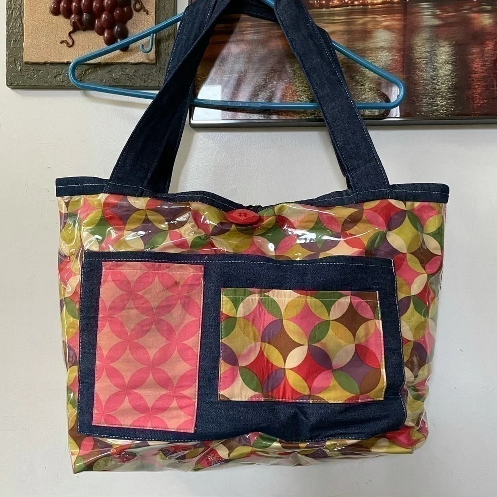 Free Large Diaper Travel Baby bag & the fabric book w. Purchase of $25+